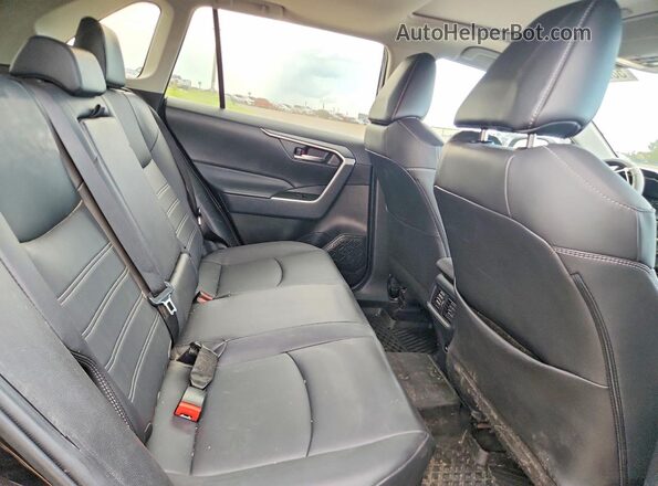 2T3RWRFV4RW236107 2024 TOYOTA RAV4 Black Вид задньої частини салону