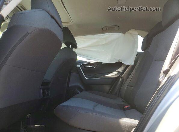 2T3RWRFV9RW219819 2024 TOYOTA RAV4 Silver Rear interior view