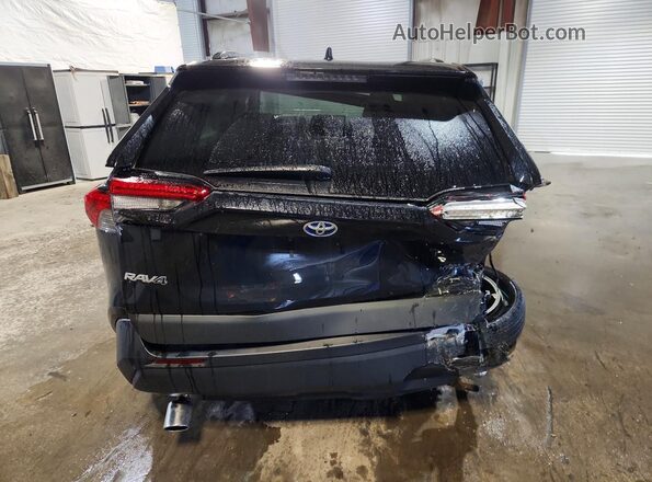 2T3RWRFV9RW237253 2024 TOYOTA RAV4 Black Rear view