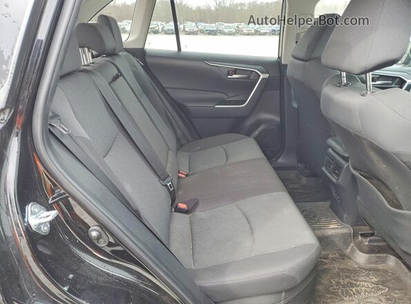 2T3UWRFVXRW239233 2024 TOYOTA RAV4 Black Rear interior view