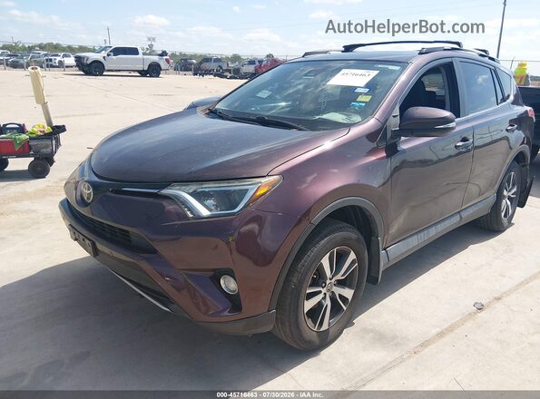 2T3WFREV0HW368378 2017 TOYOTA RAV4 Burgundy Vista tres cuartos delantera izquierda