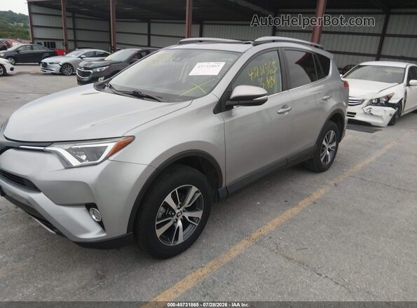 2T3WFREV0JW423580 2018 TOYOTA RAV4 Silver Front left