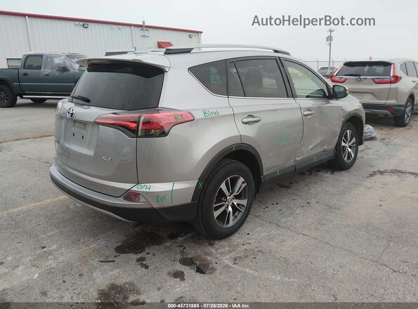 2T3WFREV0JW423580 2018 TOYOTA RAV4 Silver Rear right