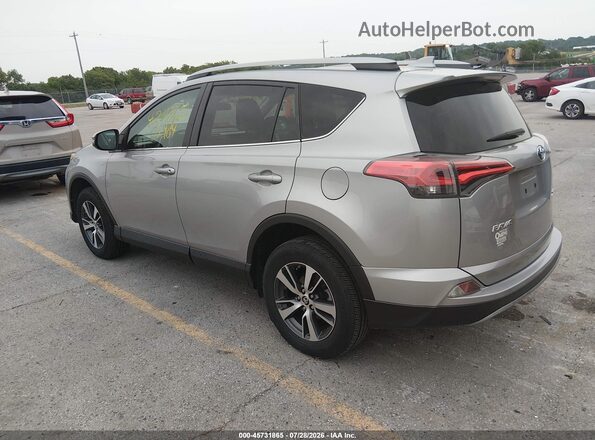 2T3WFREV0JW423580 2018 TOYOTA RAV4 Silver Rear left