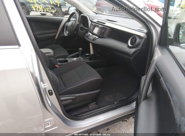 2T3WFREV0JW423580 2018 TOYOTA RAV4 Silver Front interior view
