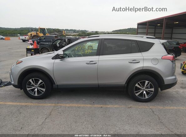 2T3WFREV0JW423580 2018 TOYOTA RAV4 Silver 360 interior view