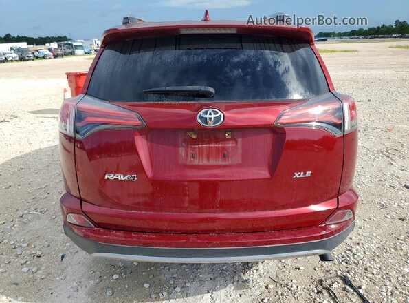 2T3WFREV0JW433526 2018 TOYOTA RAV4 Red უკანა ხედი