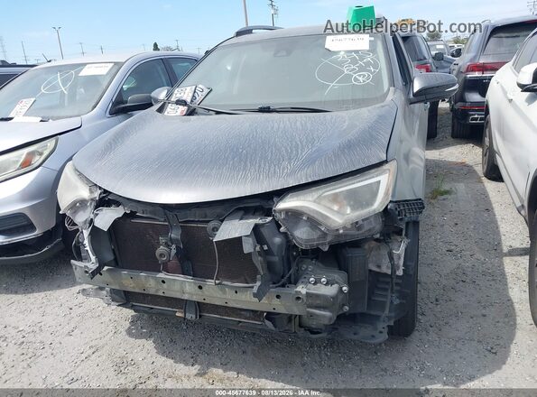 2T3WFREV0JW482581 2018 TOYOTA RAV4 Серый Вид задней части салона