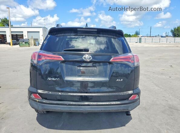 2T3WFREV0JW512565 2018 TOYOTA RAV4 Black უკანა ხედი