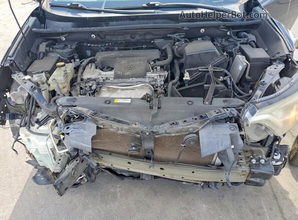 2T3WFREV0JW512565 2018 TOYOTA RAV4 Black უკანა სალონის ხედი