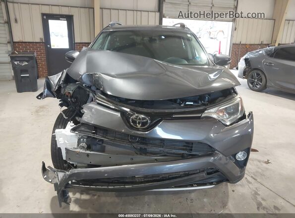 2T3WFREV0JW522268 2018 TOYOTA RAV4 Gray Widok wnętrza z tyłu