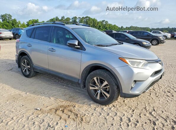 2T3WFREV1JW416122 2018 TOYOTA RAV4 Silver წინა მარჯვენა