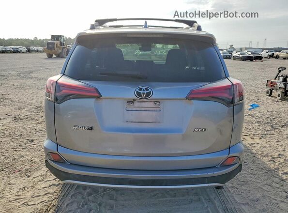 2T3WFREV1JW416122 2018 TOYOTA RAV4 Silver უკანა ხედი