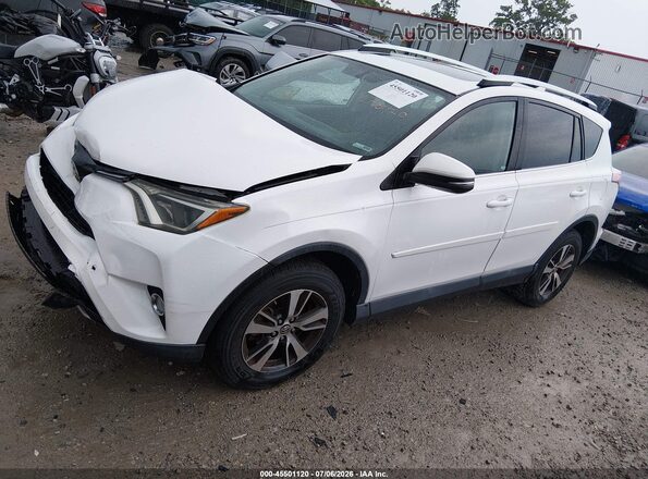 2T3WFREV2GW255661 2016 TOYOTA RAV4 White Vista tres cuartos delantera izquierda