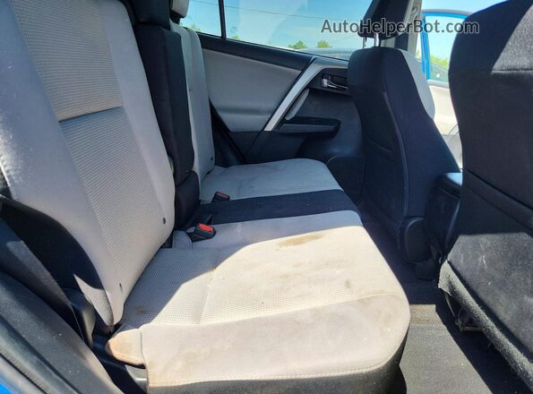 2T3WFREV2GW289101 2016 TOYOTA RAV4 Blue Vista interior trasera