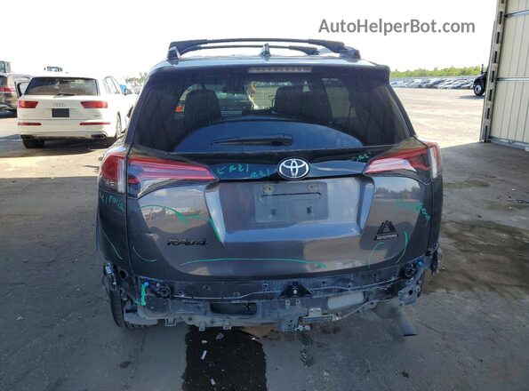 2T3WFREV2JW483909 2018 TOYOTA RAV4 Серый Вид сзади