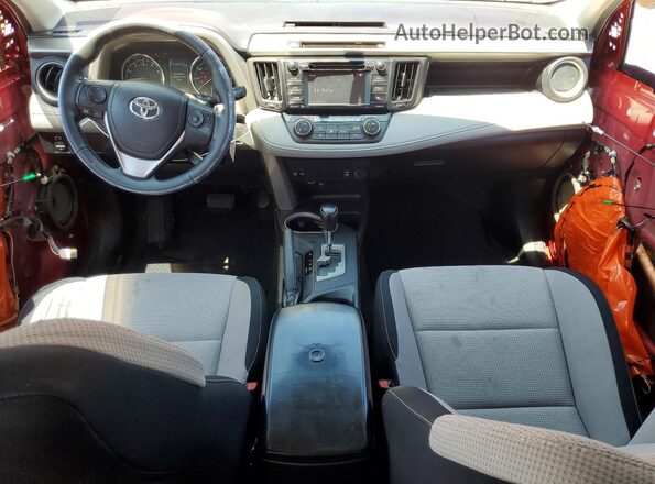 2T3WFREV3GW250615 2016 TOYOTA RAV4 Red Vista del salpicadero