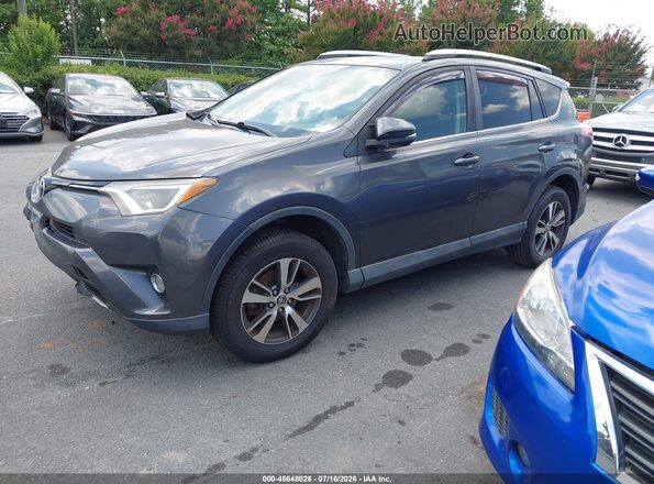 2T3WFREV3GW252803 2016 TOYOTA RAV4 Gray Առջևի ձախ երեք քառորդ տեսարան
