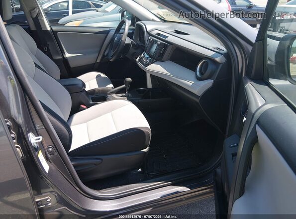 2T3WFREV3JW420978 2018 TOYOTA RAV4 Серый Вид салона спереди