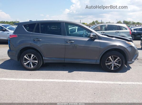 2T3WFREV3JW420978 2018 TOYOTA RAV4 Серый Вид задней части салона