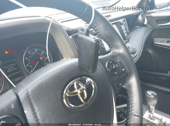 2T3WFREV3JW435268 2018 TOYOTA RAV4 Black წინა პანელის ხედი