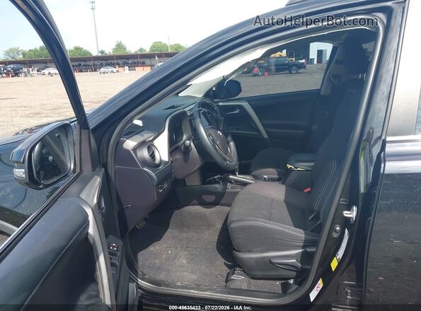 2T3WFREV3JW435268 2018 TOYOTA RAV4 Black წინა სალონის ხედი