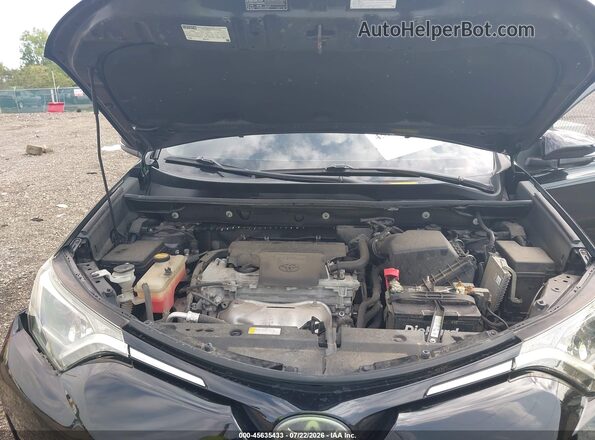 2T3WFREV3JW435268 2018 TOYOTA RAV4 Black უკანა ხედი
