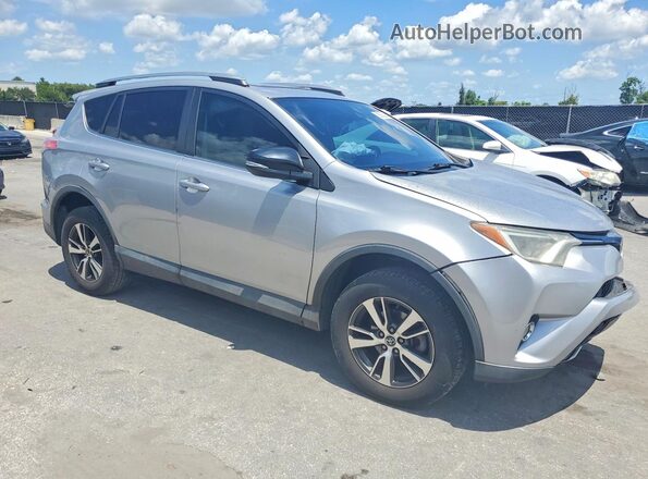 2T3WFREV3JW440552 2018 TOYOTA RAV4 Silver Front right
