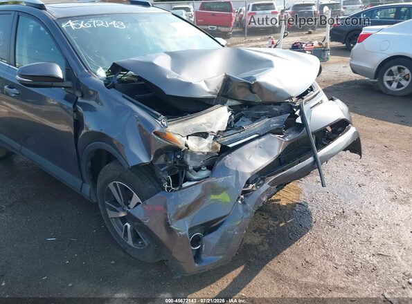 2T3WFREV4GW267830 2016 TOYOTA RAV4 Gray Vista frontal