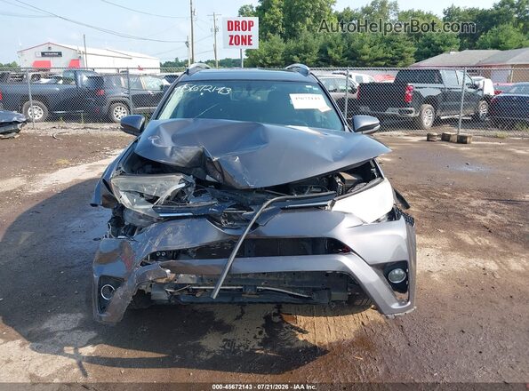 2T3WFREV4GW267830 2016 TOYOTA RAV4 Gray Vista interior trasera
