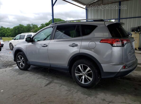 2T3WFREV4HW394692 2017 TOYOTA RAV4 Silver Tył lewy