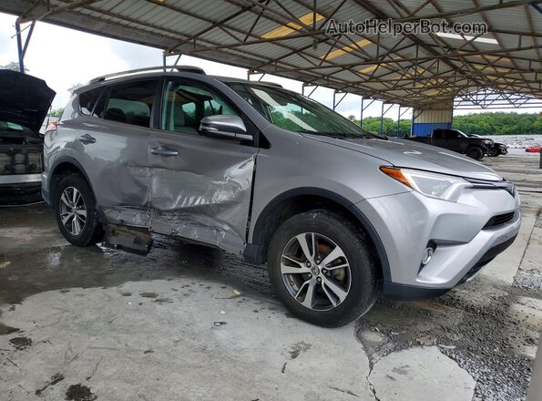 2T3WFREV4HW394692 2017 TOYOTA RAV4 Silver Przód prawy