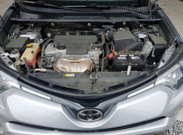 2T3WFREV4HW394692 2017 TOYOTA RAV4 Silver Widok wnętrza z tyłu