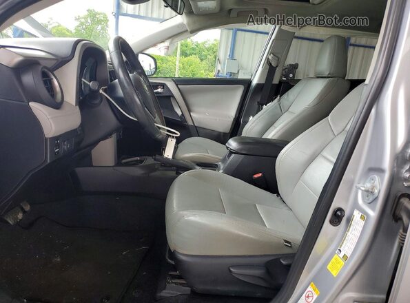 2T3WFREV4HW394692 2017 TOYOTA RAV4 Silver Widok wnętrza z przodu