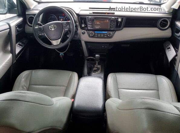 2T3WFREV4HW394692 2017 TOYOTA RAV4 Silver Widok deski rozdzielczej