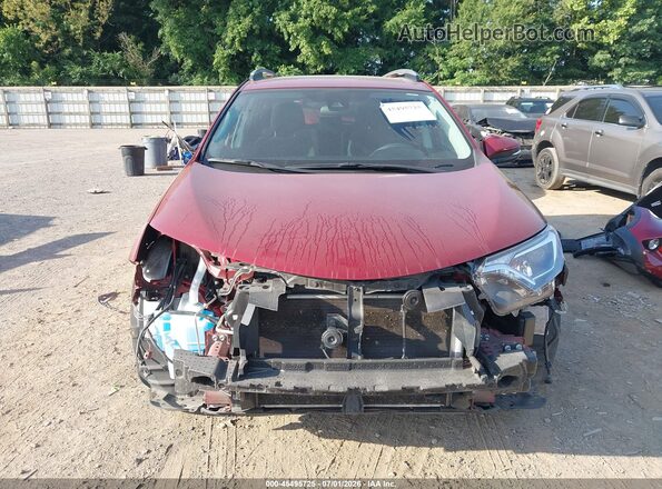 2T3WFREV4JW510916 2018 TOYOTA RAV4 Red Rear interior view