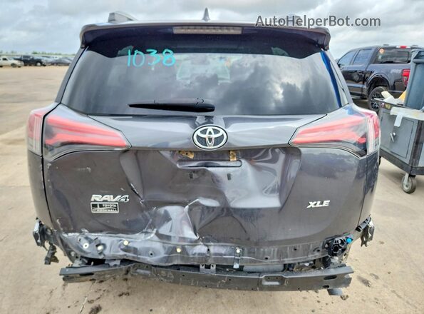 2T3WFREV4JW514710 2018 TOYOTA RAV4 Gray უკანა ხედი