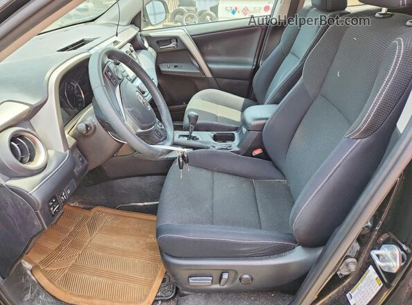 2T3WFREV5HW326921 2017 TOYOTA RAV4 Black Widok wnętrza z przodu