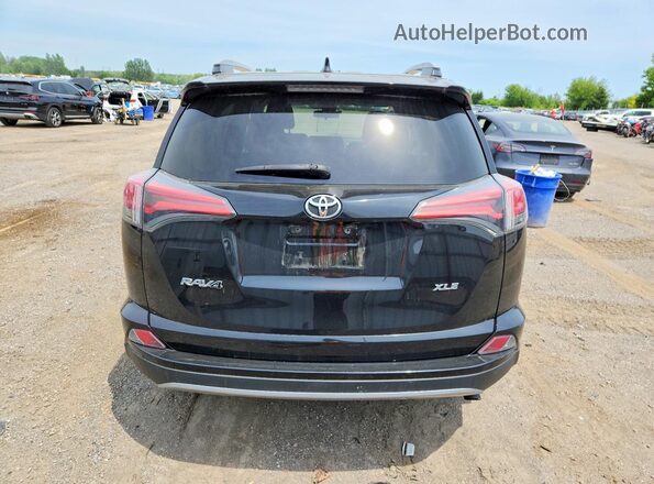2T3WFREV5HW326921 2017 TOYOTA RAV4 Black Widok z tyłu