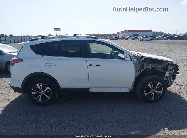 2T3WFREV6GW248017 2016 TOYOTA RAV4 White უკანა სალონის ხედი