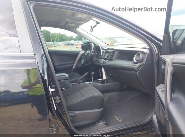 2T3WFREV6GW261415 2016 TOYOTA RAV4 Черный Вид салона спереди