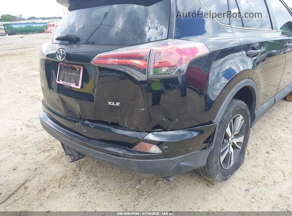 2T3WFREV6GW261415 2016 TOYOTA RAV4 Черный Вид спереди