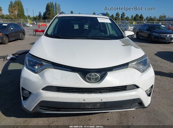 2T3WFREV6HW372192 2017 TOYOTA RAV4 White Սալոնի հետևի տեսք