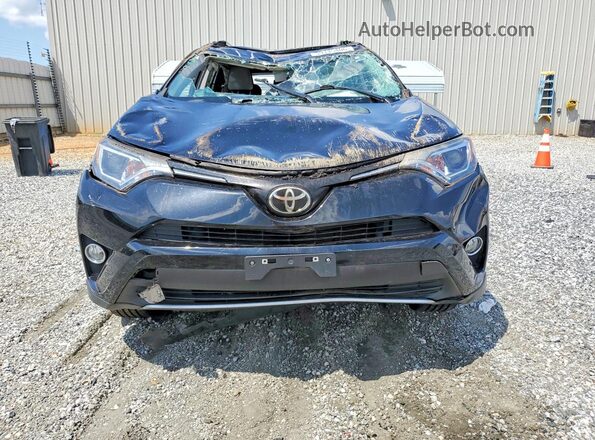 2T3WFREV6JW408663 2018 TOYOTA RAV4 Black Vista frontal