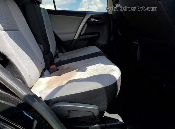 2T3WFREV6JW408663 2018 TOYOTA RAV4 Black Vista interior trasera