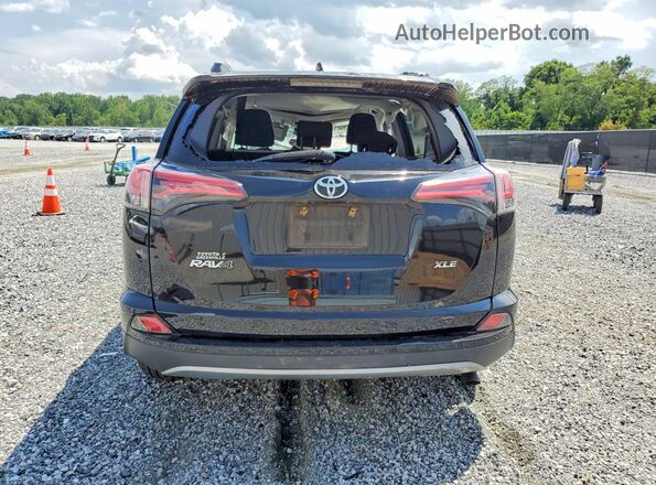 2T3WFREV6JW408663 2018 TOYOTA RAV4 Black Vista trasera