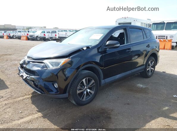 2T3WFREV6JW510853 2018 TOYOTA RAV4 Black Front left