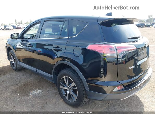 2T3WFREV6JW510853 2018 TOYOTA RAV4 Black Rear left