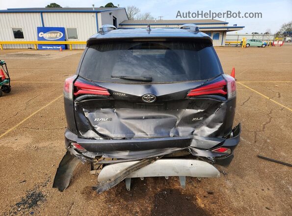 2T3WFREV7JW406758 2018 TOYOTA RAV4 Gray Widok z tyłu
