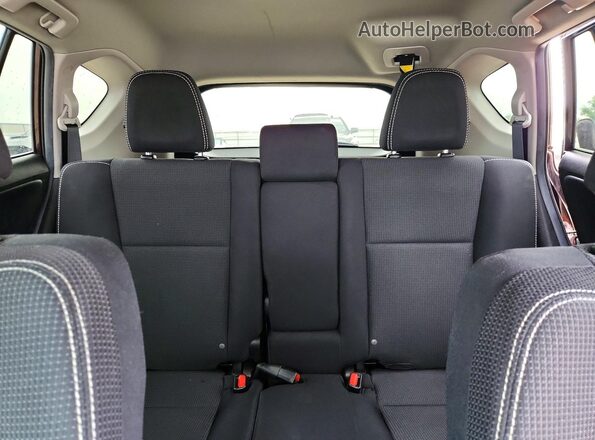 2T3WFREV7JW425424 2018 TOYOTA RAV4 Purple Widok tylnych siedzeń